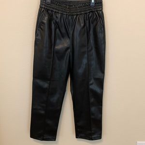 Pleather crop pants with front pipe seam. 24.5” inseam. Comfortable wide waist.